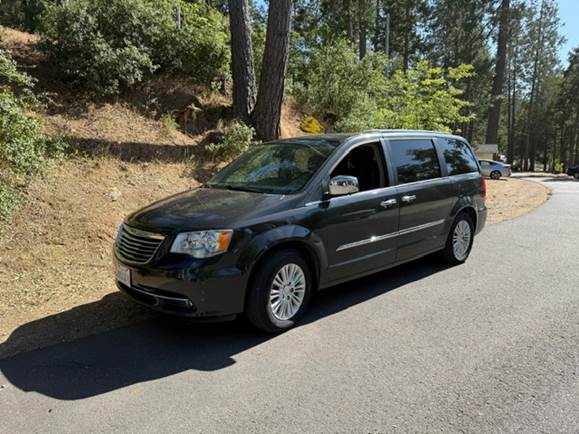 A car parked on the side of a road

AI-generated content may be incorrect.